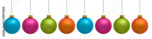 Blue, pink and green colorful Christmas ornaments on white