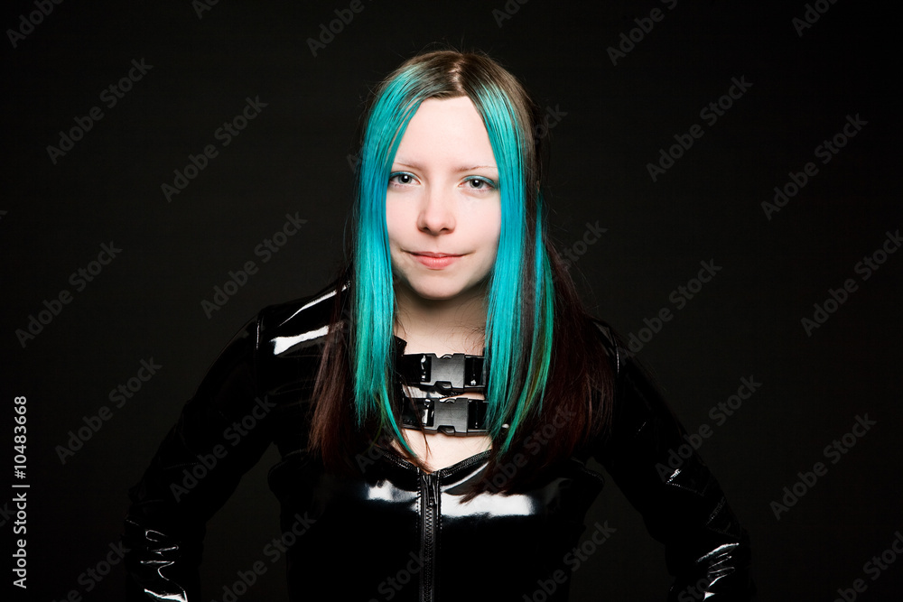 Young teenage gothic girl looking at the camera