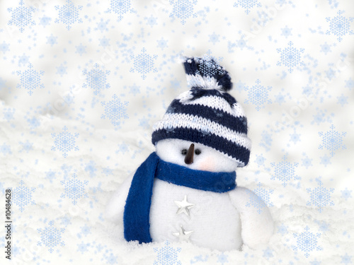 Snowman in snowflakes on a light background