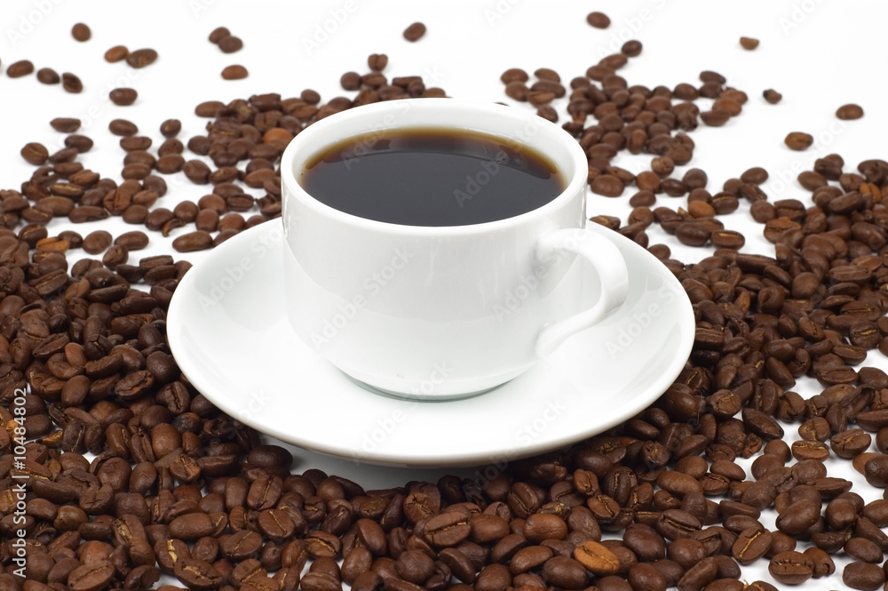 close-up white cup of coffee and coffee grains close-up white cup of coffee and coffee grains