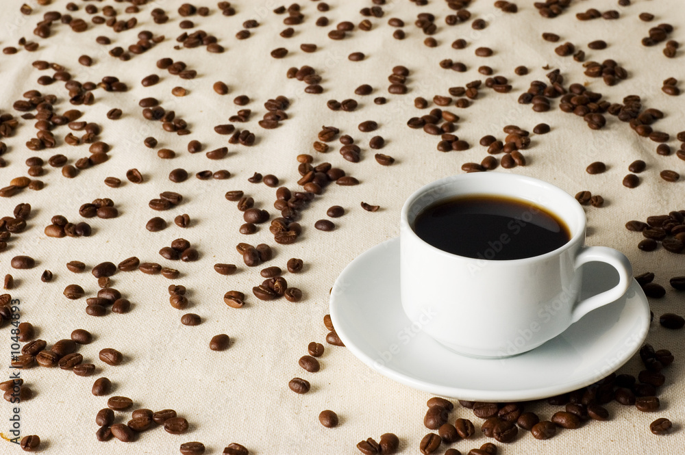 white cup of coffee and coffee grains white cup of coffee and coffee grains