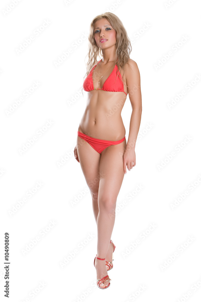 Smiling young curly blonde woman in the red bikini Smiling young curly blonde woman in the red bikini