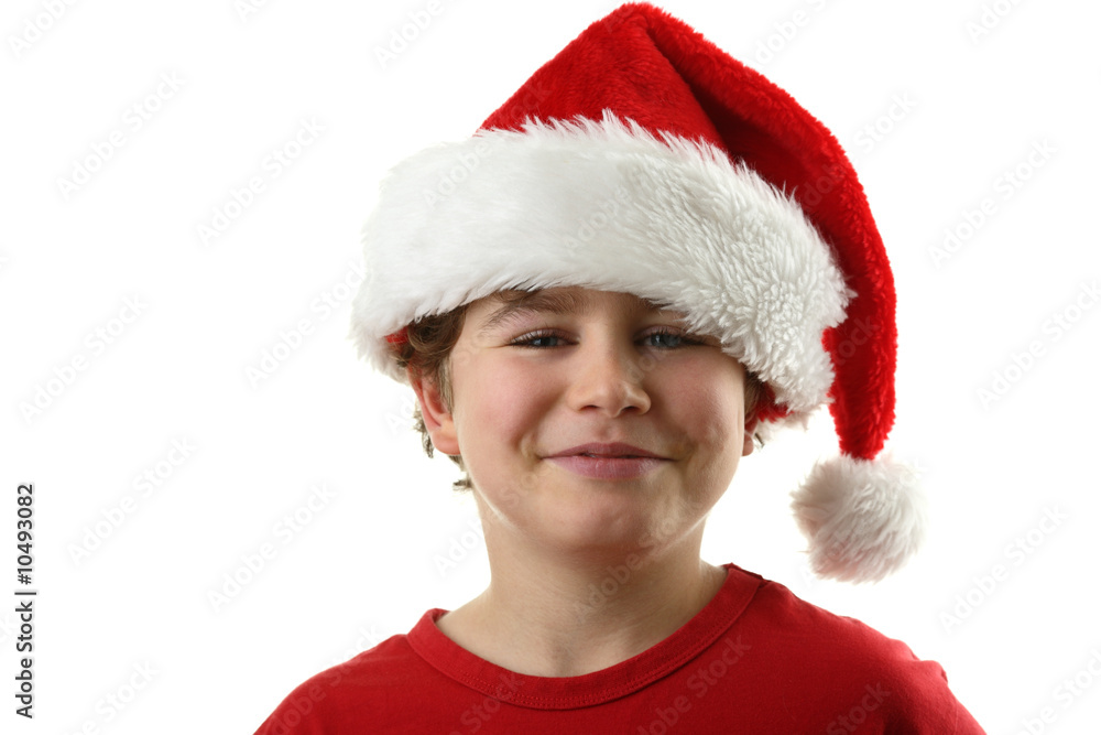 Christmas time - boy with Santa's hat isolated on white Christmas time - boy with Santa's hat isolated on white