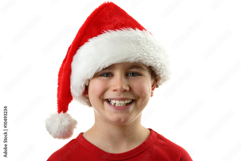 Christmas time - boy with Santa's hat isolated on white Christmas time - boy with Santa's hat isolated on white