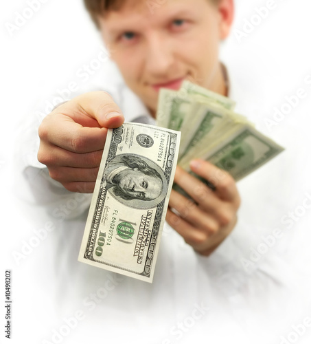 man giving one hundred dollars banknote isolated on white