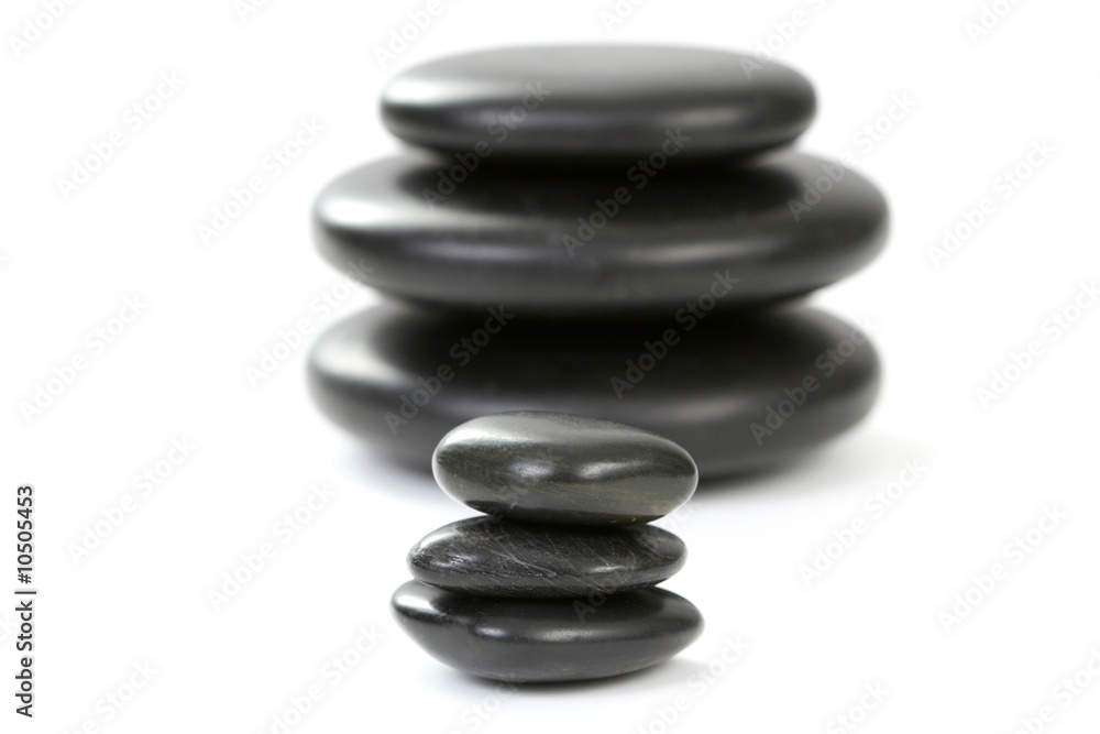 black pebbles isolated on white - health and beauty black pebbles isolated on white - health and beauty