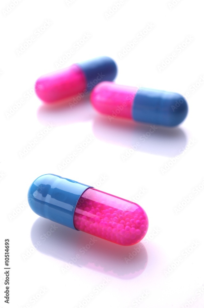 Pink and blue capsules Pink and blue capsules