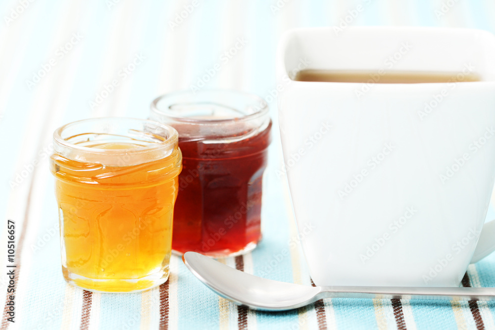 cup of delicious tea with sweet confiture cup of delicious tea with sweet confiture