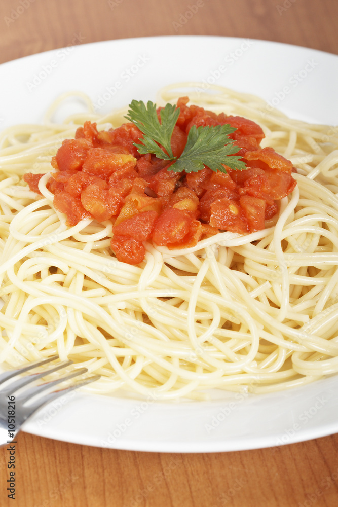 Freshly cooked Spaghetti with tomato sauce. Shallow DOF Freshly cooked Spaghetti with tomato sauce. Shallow DOF