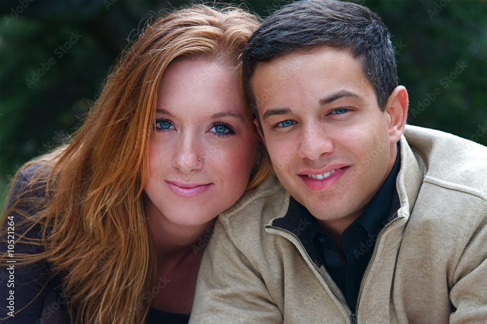 Young couple in an autumn forest picnic area Young couple in an autumn forest picnic area
