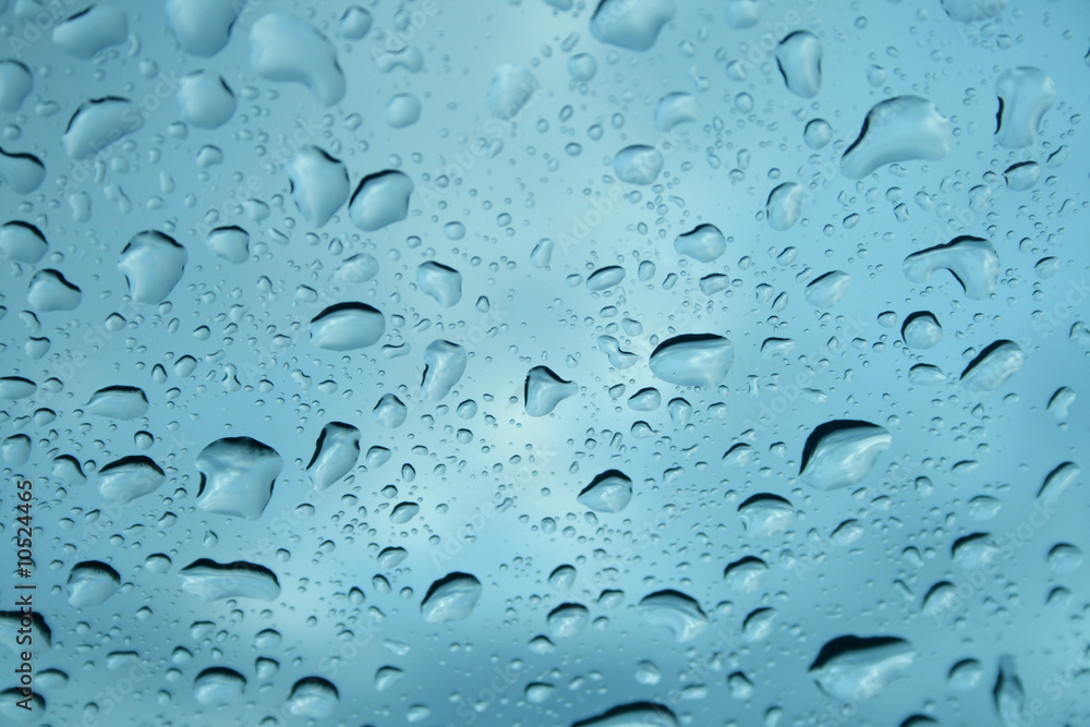 Fototapeta premium Rain drops on glass window.