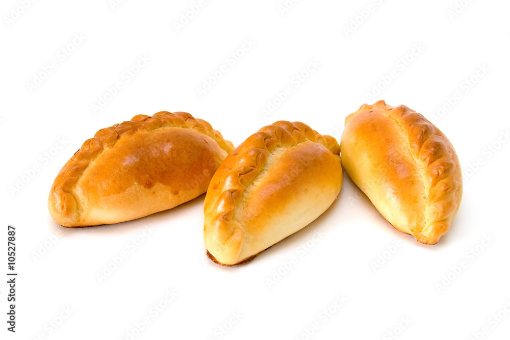 Traditional russian cabbage stuffed baked pastry isolated Traditional russian cabbage stuffed baked pastry isolated