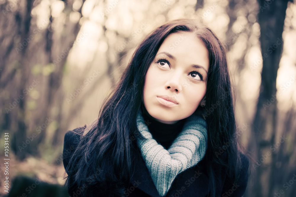 Young woman outdoors portrait. Soft red tint. Young woman outdoors portrait. Soft red tint.
