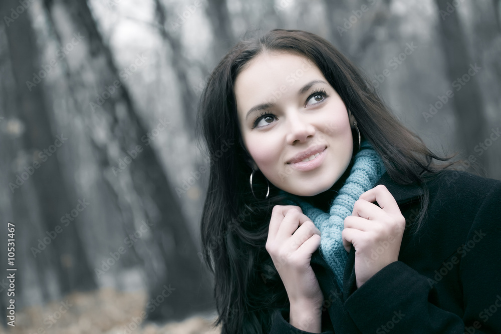 Young smiling woman outdoors portrait. Young smiling woman outdoors portrait.