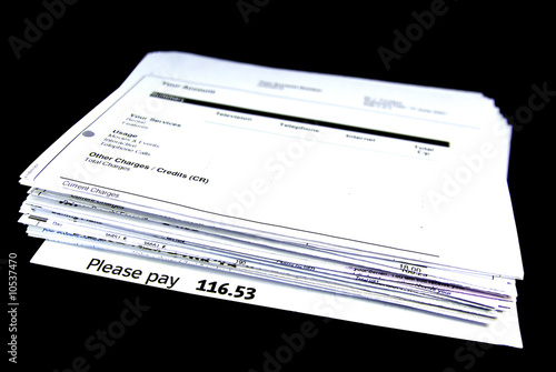 Bill stack over a black background.