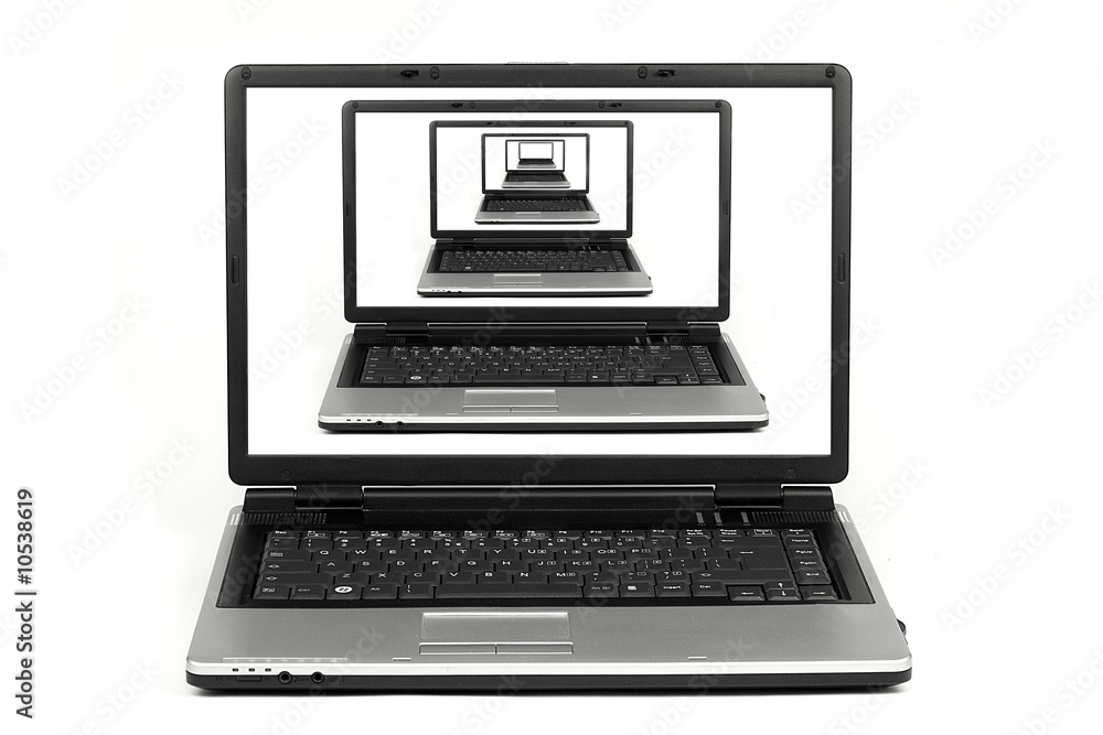 Fototapeta premium Isolated laptop with multiplied laptop on screen