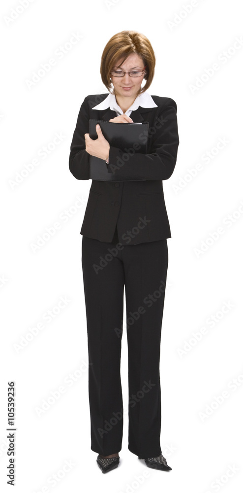 Young businesswoman writing something on a wallet Young businesswoman writing something on a wallet