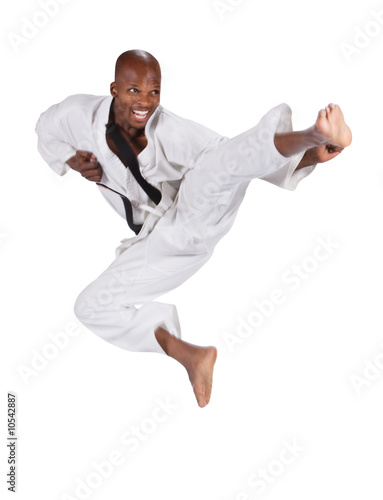 african american man in karate suit, suspended in mid air