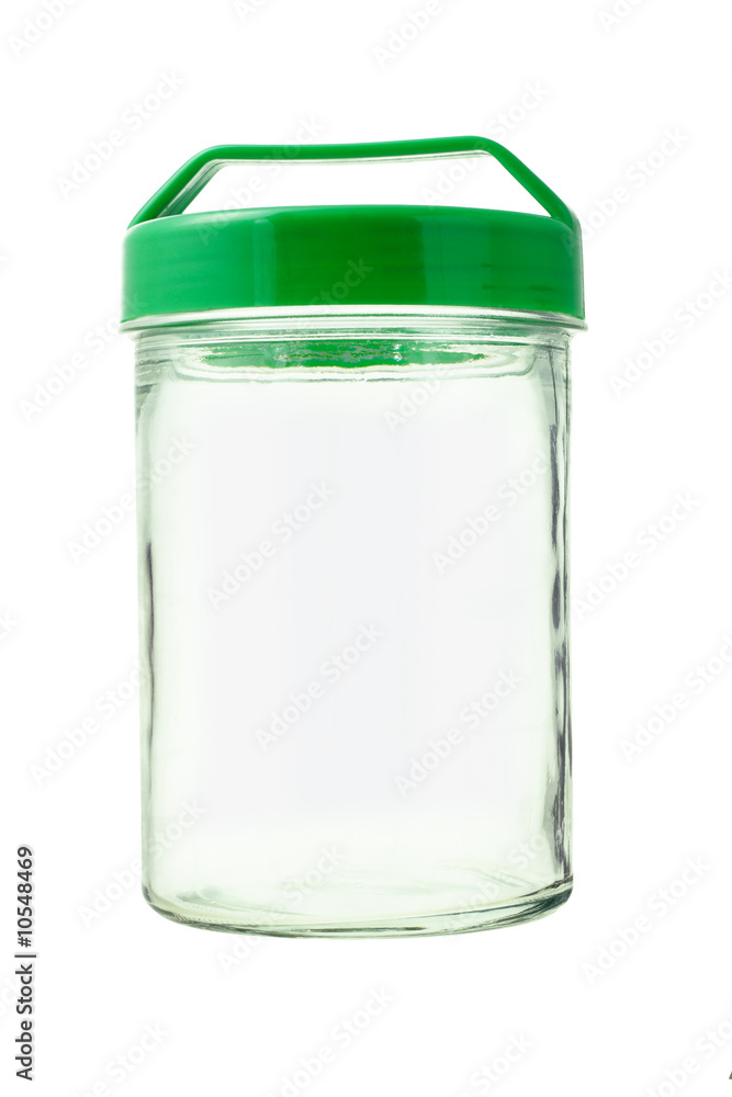 Empty glass jar with green plastic lid on white background Empty glass jar with green plastic lid on white background