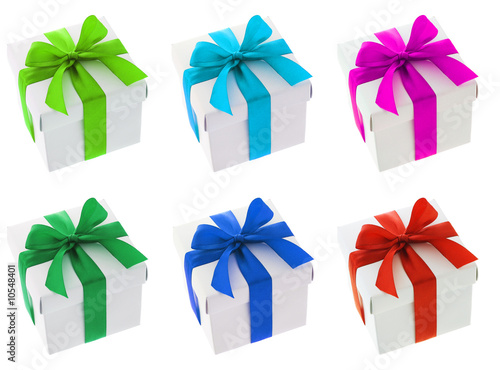 White gift boxes with different color bow ribbons