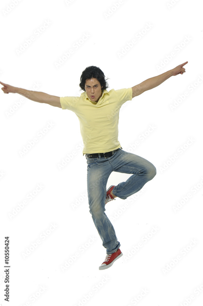 Attractive Young man flying in the air Attractive Young man flying in the air