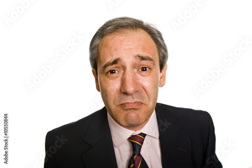 sad mature business man on a black background