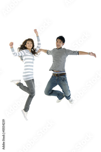happy Asian friends jumping