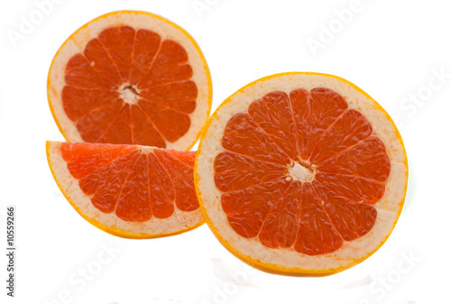 Fototapeta Naklejka Na Ścianę i Meble -  Juicy and bright grapefruit isolated on the white