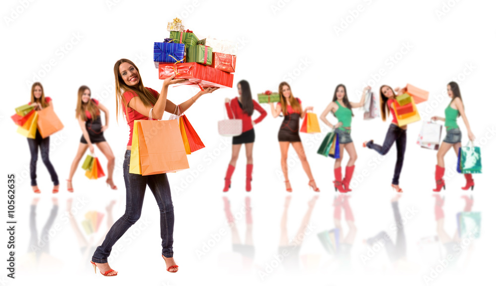 Obraz premium Shopping woman with bag and gift boxes