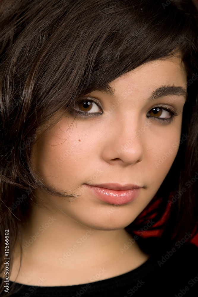 young woman portrait isolated on red background young woman portrait isolated on red background