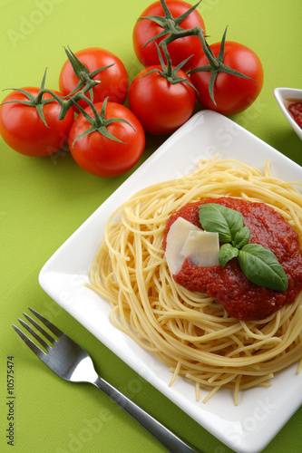 Italian pasta spaghetti with tomato sause and parmesan.