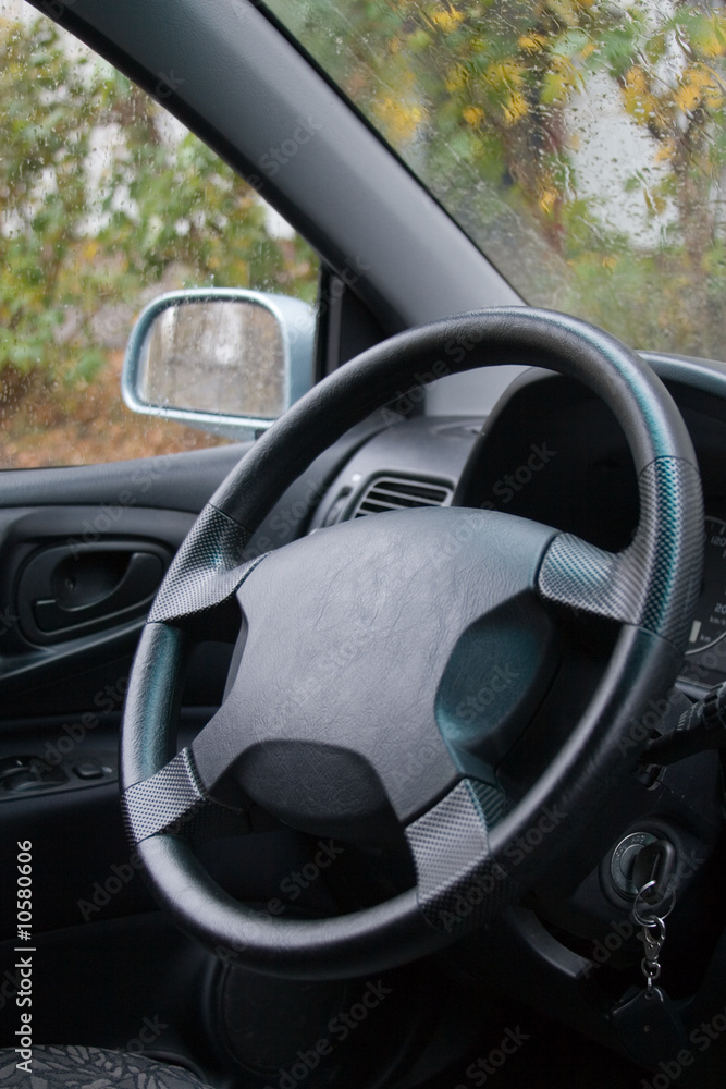 Wheel and dashboard of a car Wheel and dashboard of a car