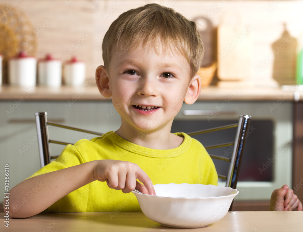 Joyful breakfast of little boy Joyful breakfast of little boy