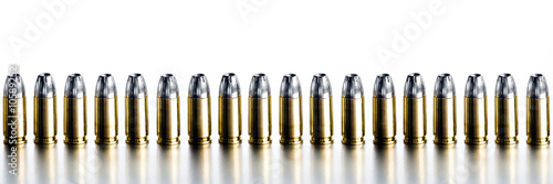 Fotografija bullets 9mm high contrast banner isolated on white