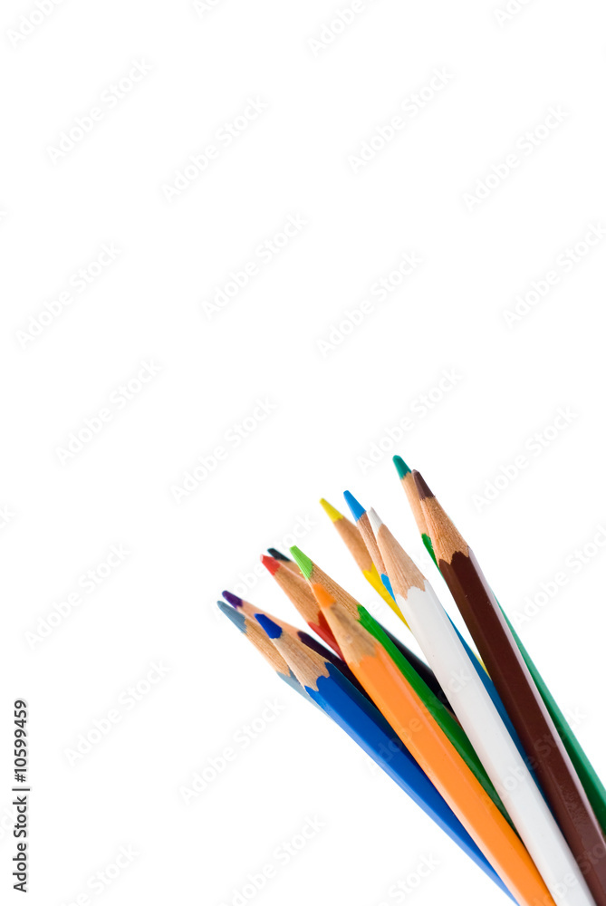 Color pencils isolated on white in a decorative way