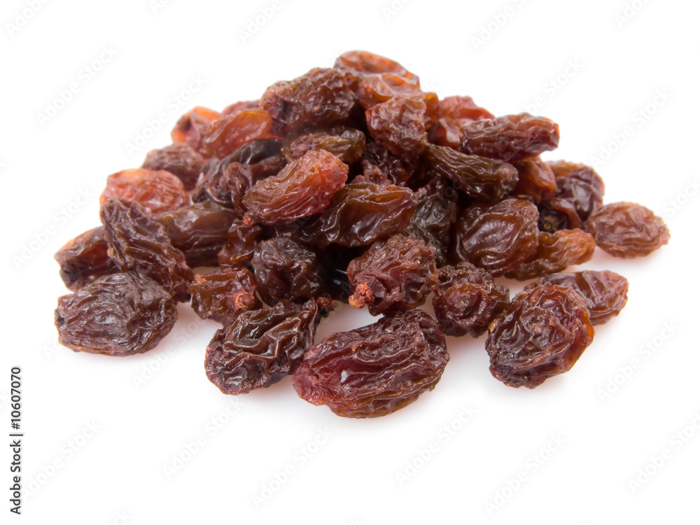 Pile of raisins isolated on white background.