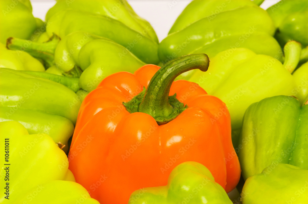 Bell peppers arranged at the market stand Bell peppers arranged at the market stand