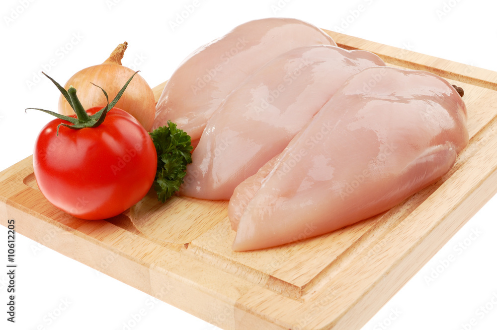 Raw chicken breasts isolated on white Raw chicken breasts isolated on white