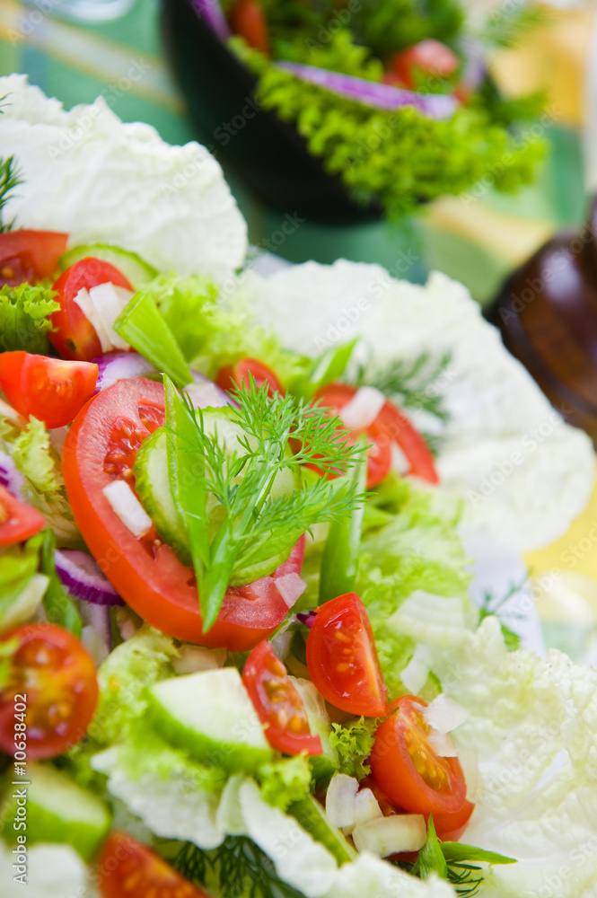 Fresh vegetable salad with tomato and cucumber