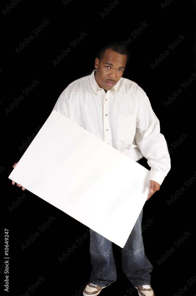 young African American man with sign board