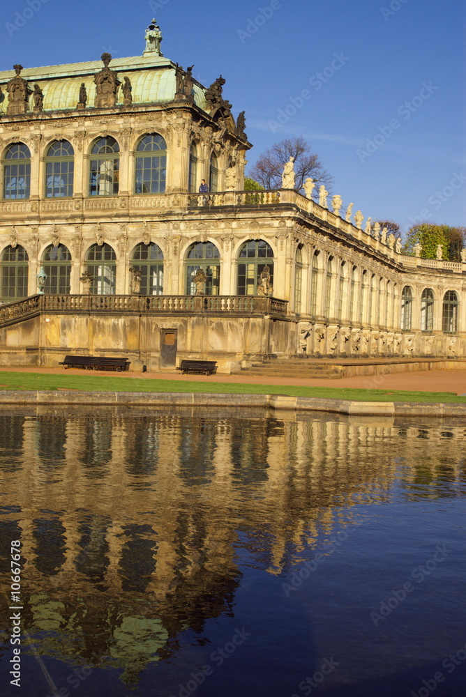 Zwinger palace in Dresden with reflection in pond