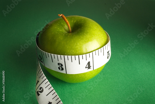 apple and measuring tape photo