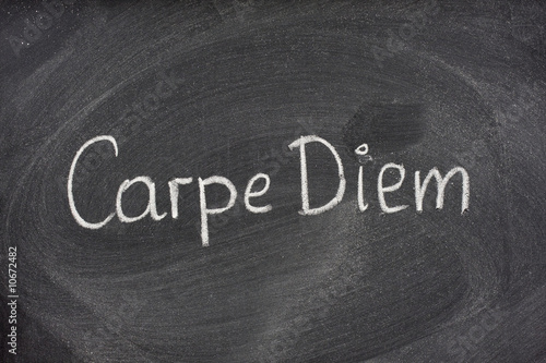 Carpe Diem phrase on blackboard