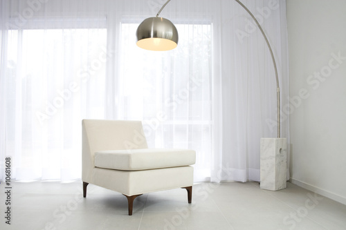 Contemporary interior with lamp and chair