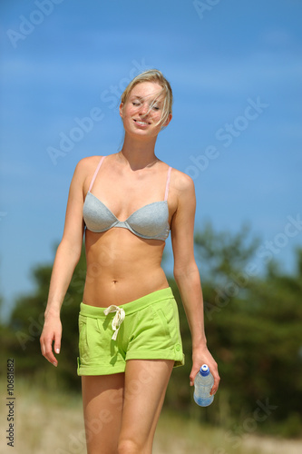 Portrait of blond female on the beach