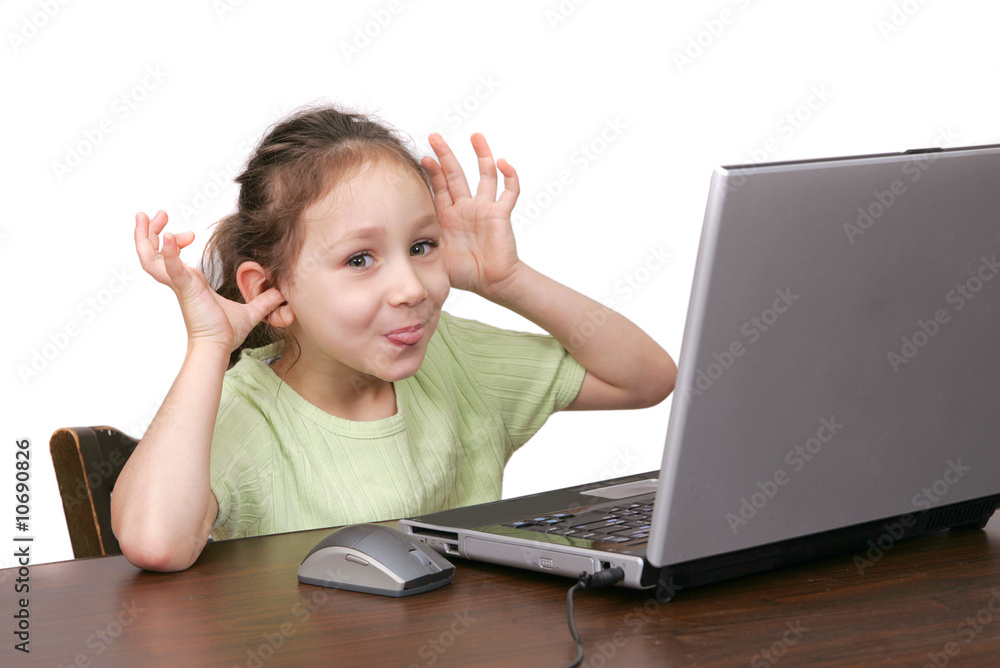 young girl goofing on computer