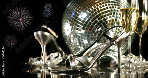 Silver party shoes with champagne glasses