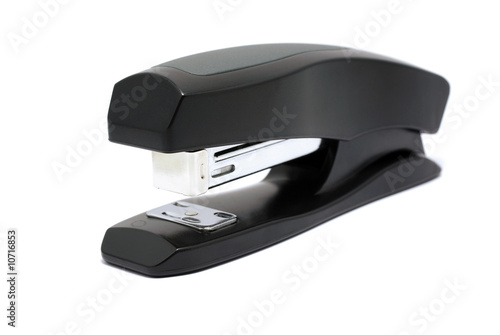 Black with gray stapler isolated on white background.