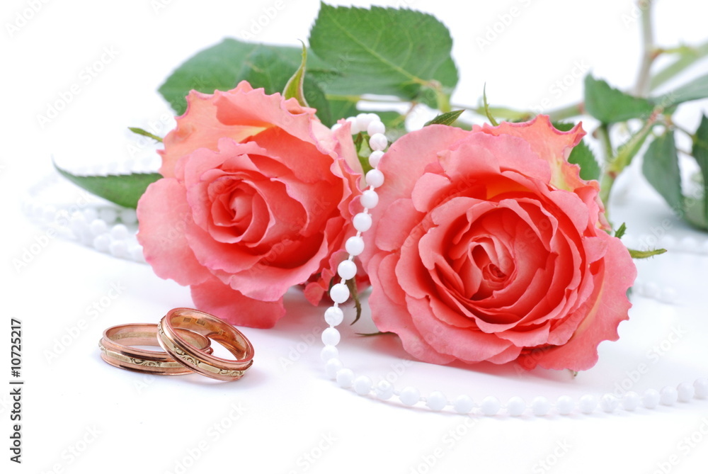Wedding concept with roses and rings Wedding concept with roses and rings