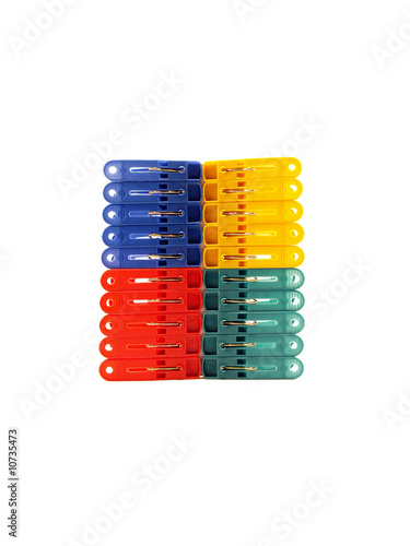 colorful clothes-pegs on white